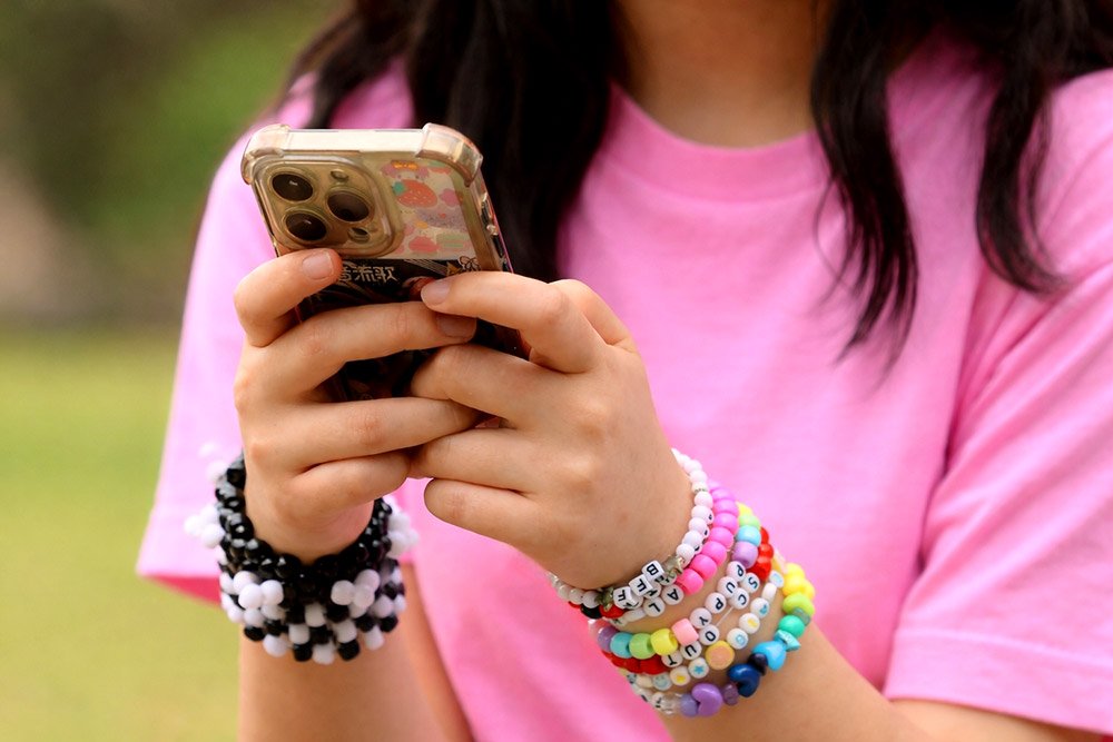 girl is looking at a social network